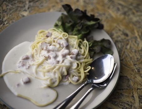 Spaghetti menu on wooden table