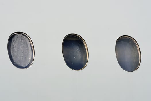 Port holes on aircraft cabin