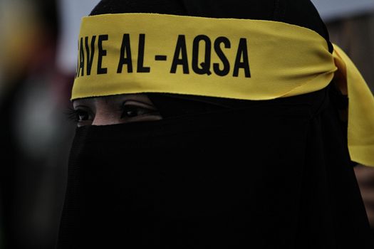 MALAYSIA, Kuala Lumpur: Hundreds of Malaysians took part in the rally 'Save Al-Aqsa Mosque' in the capital Kuala Lumpur on October 2, 2015. 	Over 30 Malay-Muslim groups took part in the action, to protest what they describe as the Zionist regime's invasion of the Al-Aqsa Mosque in Jerusalem Old City. 