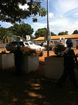 CAR, Bangui: Outside MINUSCA HQ, Avenue Barth�l�my. Violence between armed communities erupted after a Muslim motorbike taxi driver was killed, sparking riots in the CAR capital. At least 36 were killed, some 200 injured and 30,000 displaced. The aftermath of some of the clashes is seen here with even UN cars attacked, and a heavy presence of police and UN peacekeepers on the streets, on September 29, 21015.  