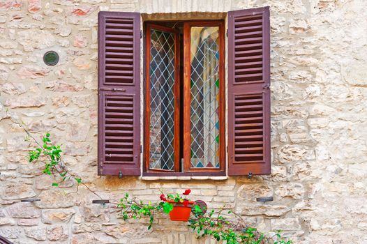 Italian Window with Open Wooden Shutters, Decorated With Fresh Flowers