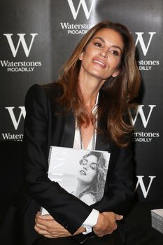 UK, London: American supermodel Cindy Crawford, best known for being one of the five original supermodels discussed her new book and signed copies in Waterstones, London on September 2, 2015. Becoming chronicles her life and career, as she prepares to turn 50 next February, and features some of her most memorable images. 