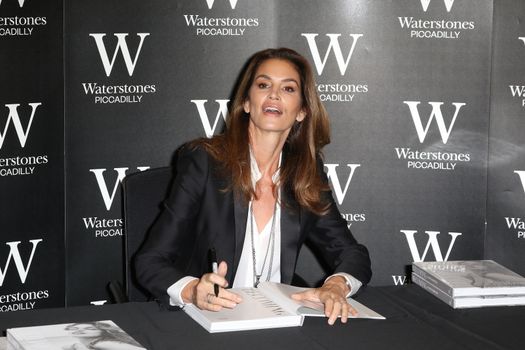 UK, London: American supermodel Cindy Crawford, best known for being one of the five original supermodels discussed her new book and signed copies in Waterstones, London on September 2, 2015. Becoming chronicles her life and career, as she prepares to turn 50 next February, and features some of her most memorable images. 