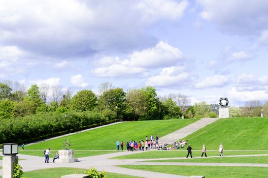 OSLO - MAY 18: Statues in Vigeland park in Oslo, Norway on May 18, 2012. The park covers 80 acres and features 212 bronze and granite sculptures created by Gustav Vigeland.