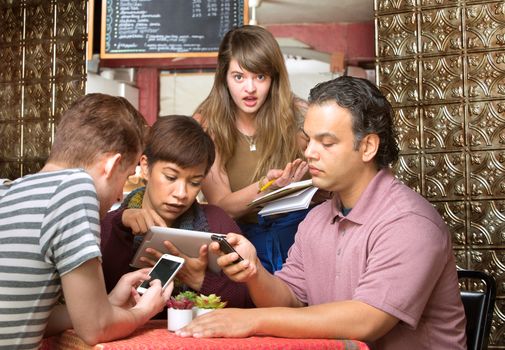 Rude diners ignoring waitress in a coffee house