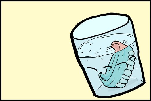 Prosthetic denture teeth under water inside drinking glass
