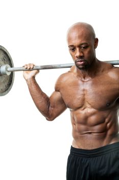 Toned and ripped lean muscle fitness man lifting weights isolated over a white background.