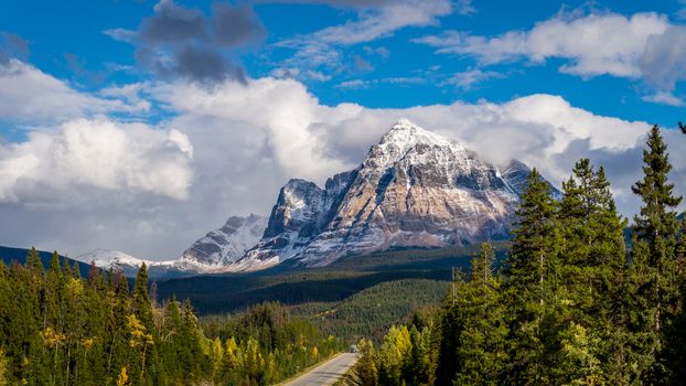 Mount Fitzwilliam is part of the Canadian Rockies in British Columbia. The lower half being dolomite and the upper half quartzite covered with lichen which gives it a very dark gray color