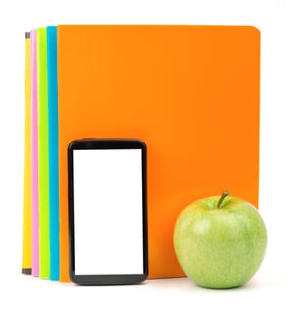 Fresh apple with exercise books and smartphone on isolated white background