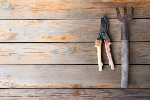 Old wooden texture background with tools, close up view