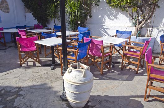 Caffe in Greece with colorful chairs