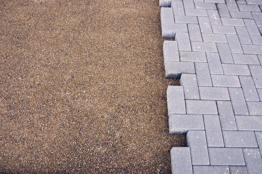 An element of paving of sidewalk - work place in street