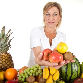 Many fruits stacked together and cute woman