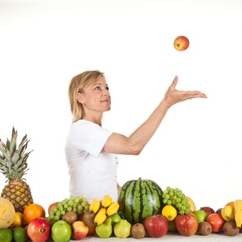 Many fruits stacked together and cute woman