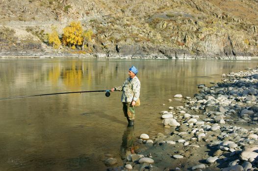 The Clean mountain river by autumn.Mountain Altai