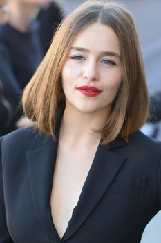 FRANCE, Paris: Emilia Clarke is pictured as she arrives at Dior Fashion Show in Paris on October 2, 2015.