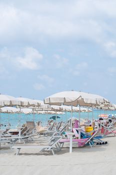 Many umbrellas and chairs at a resort in southern Italy