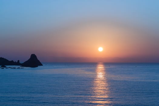 The sunset on the sea of sicily