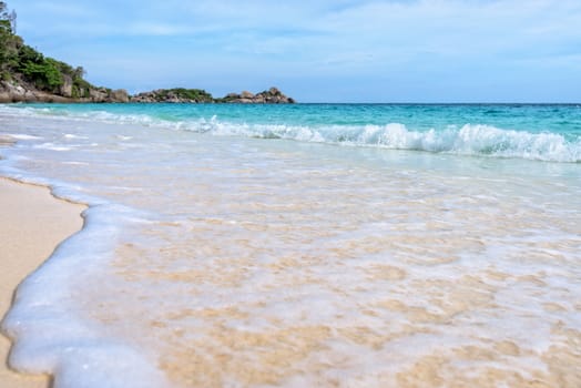 Beautiful landscape blue sea white sand and waves on the beach during summer at Koh Miang island in Mu Ko Similan National Park, Phang Nga province, Thailand