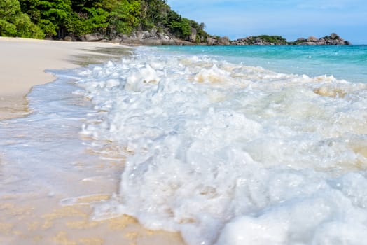 Beautiful landscape blue sea white sand and waves on the beach during summer at Koh Miang island in Mu Ko Similan National Park, Phang Nga province, Thailand