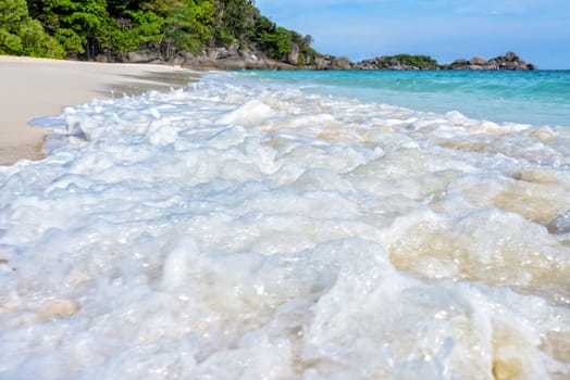 Beautiful landscape blue sea white sand and waves on the beach during summer at Koh Miang island in Mu Ko Similan National Park, Phang Nga province, Thailand