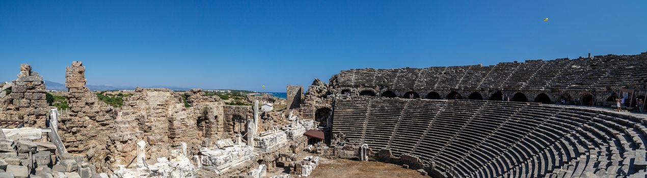 MANAVGAT, ANTALYA - JULY 20, 2015 : Panoramic view of the amphitheater in Side Ancient City, in Antalya which is thought to be built before 7th century bc.