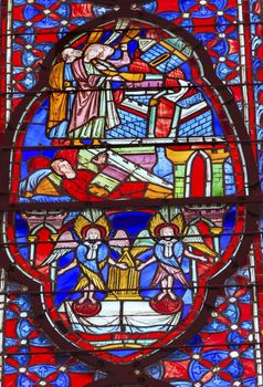 Angels Disciples Stained Glass Saint Chapelle Paris France.  Saint King Louis 9th created Sainte Chappel in 1248 to house Christian relics, including Christ's Crown of Thorns.  Stained Glass created in the 13th Century and shows various biblical stories along wtih stories from 1200s.