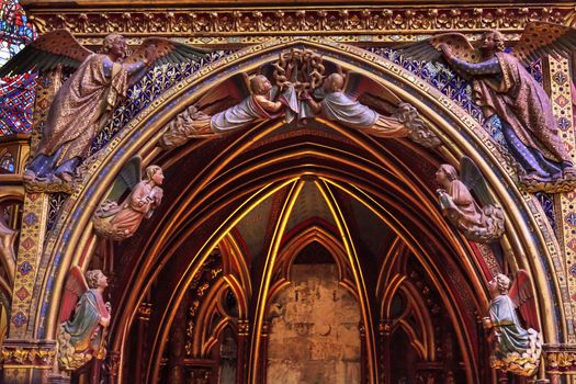 Angels Wood Carvings Cathedral Saint Chapelle Paris France.  Saint King Louis 9th created Sainte Chapelle in 1248 to house Christian relics, including Christ's Crown of Thorns.  Stained Glass created in the 13th Century and shows various biblical stories along with stories from 1200s.