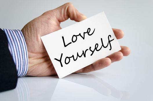 Love yourself text concept isolated over white background