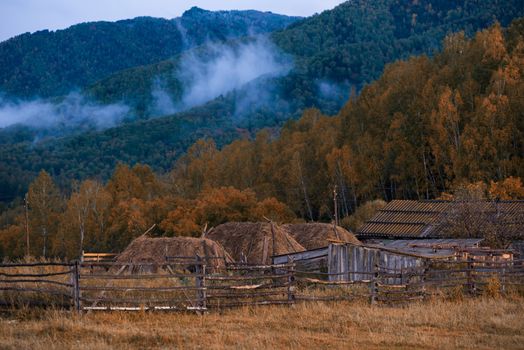 Autumn at mountain village at evening