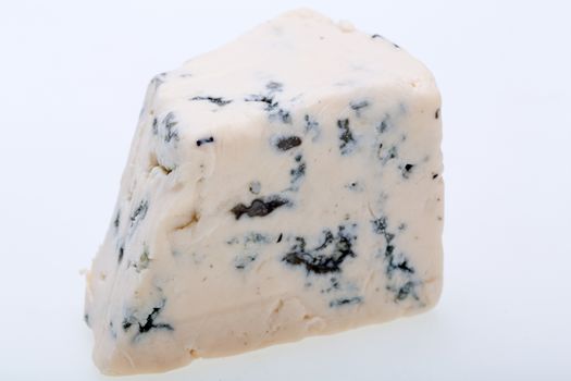 piece of blue cheese on white background 