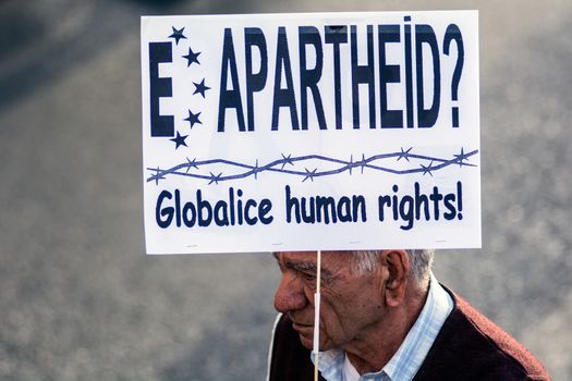 SPAIN, Madrid: Protesters call for people to stand up against unemployment, precarity, and social exclusion on October 3, 2015 in Madrid as they march from Gibraltar to Brussels.  The march took place in the Plaza de Cibeles where protesters were seen waving Spain's republican flag and banners calling for Brussels to recognise an 'alternative Europe'.  The action was organised by several entities, including trade unions and political parties. 