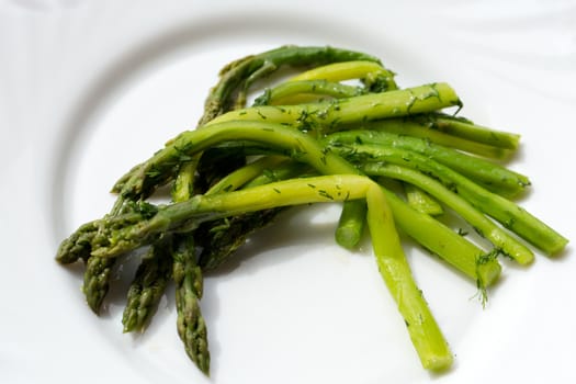 green asparaguses with the fresh dill