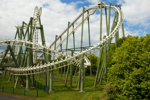 Germany.Heide Park Resort.you can see a fragment of roller coaster "Big Loop".Photo was taken in May 2015