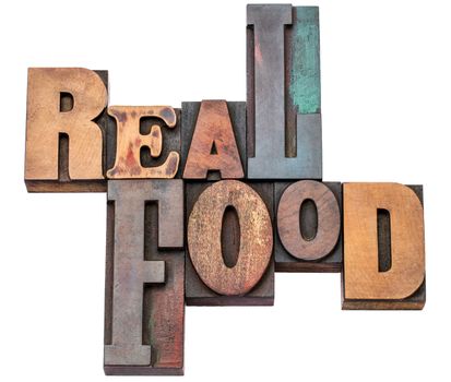 real food word abstract - isolated text in mixed letterpress wood type printing blocks - healthy eating and lifestyle concept