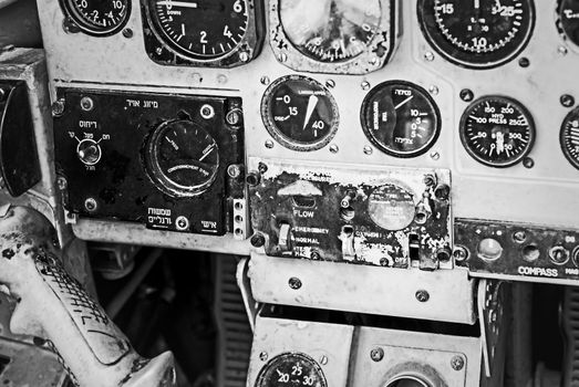 Old device in the pilot cockpit black and white photo