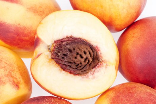 fresh nectarine on white background, close up