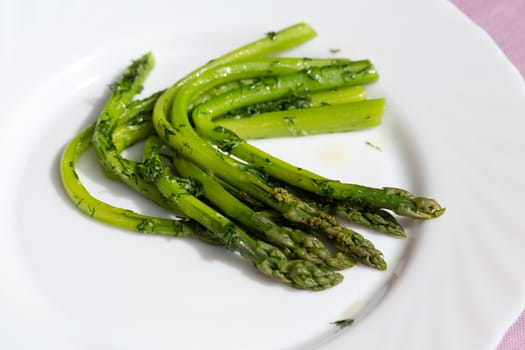 green asparaguses with the fresh dill