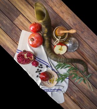 Honey jar with apples and pomegranate for Rosh Hashana religious holiday