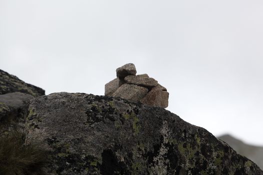 A stack of stones in the mountains.