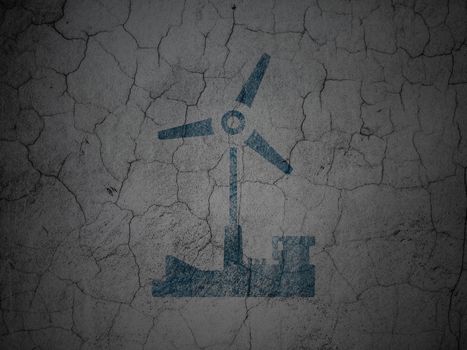 Industry concept: Blue Windmill on grunge textured concrete wall background
