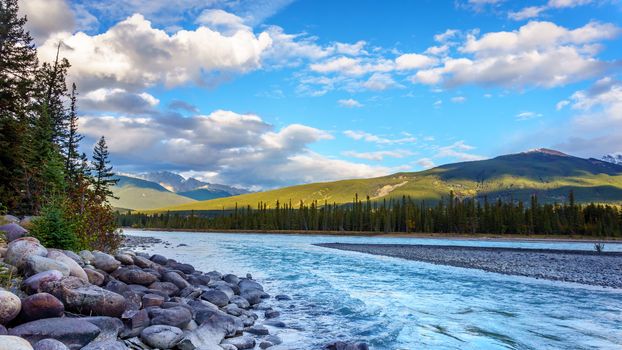 Daybreak over the Athabasca River near the town of Jasper in Jasper National Park in the Canadian Rocky Mountains