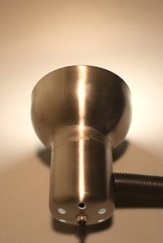 Photograph of a metal lighted lamp