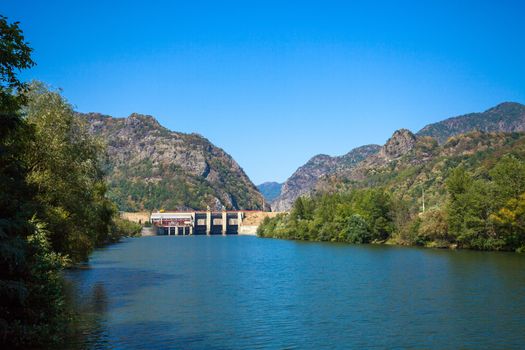 Cozia, Romania - Septemper 2, 2012: Dam built on Olt river on a sunny summer day, Romania