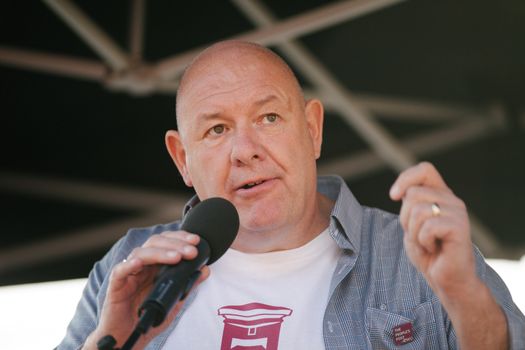UNITED KINGDOM, Manchester: Dave Ward speaks during an anti-austerity march organized by The Peoples Assembly in protest against the Conservative Party Conference in Manchester, United Kingdom on October 4, 2015. The demonstrators were protesting against cuts on benefits, National Health System reforms and restriction on the ability for trade unions to go on strike. 