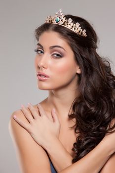 Young beautiful woman with a diadem