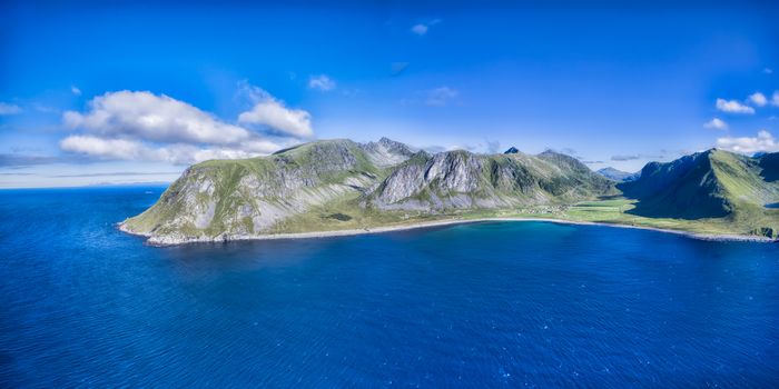 Scenic aerial panorama of Lofoten islands in Norway, with village Unstad