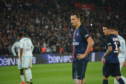 FRANCE, Paris : Zlatan Ibrahimovic stands on the Parc des Princes field during a Ligue 1 match between Paris-Saint-Germain and Marseille on October 4th, 2015. The player became the PSG's top goalscorer of all time when he led the French champions to a 2-1 home win against Marseille. 