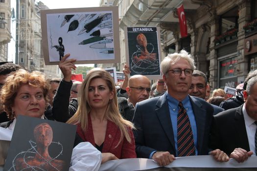 TURKEY, Istanbul: Turkish journalists protested against pressure put on the press by the government, and attacks towards journalists, in Istanbul on September 3, 2015.	News directors, editors and reporters participated in the protests, calling for a free and independent press. Banners included the sign in black and white stating: Free press cannot be silenced.