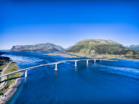Bridge on Lofoten islands in Norway, scenic aerial view